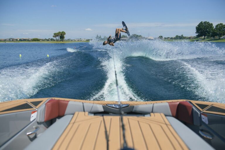 Inverted male water skier